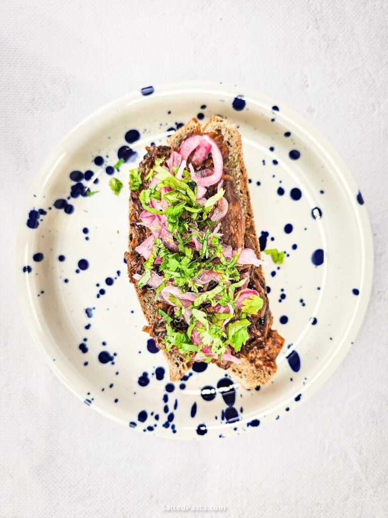 Pulled pork sandwich on a plate - top view